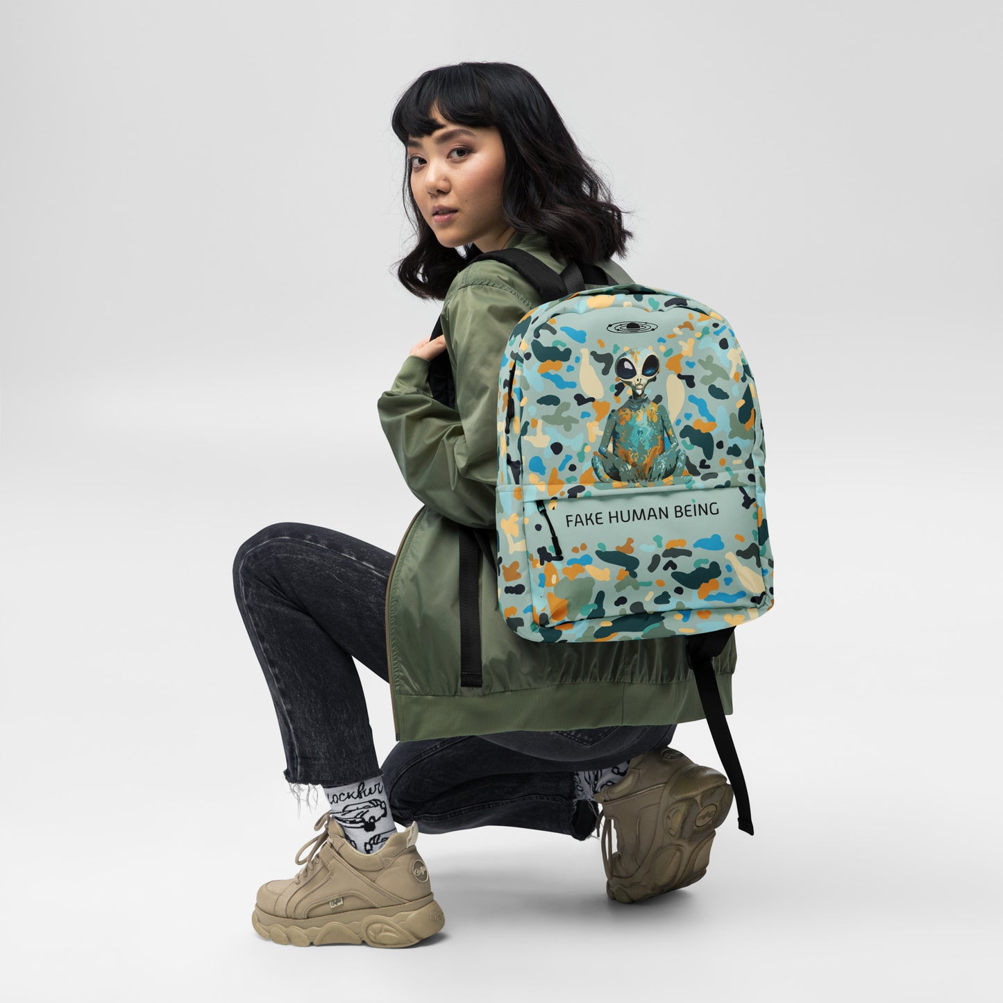 OUT OF SPACE. Backpack, water-resistant. FAKE HUMAN BEING.