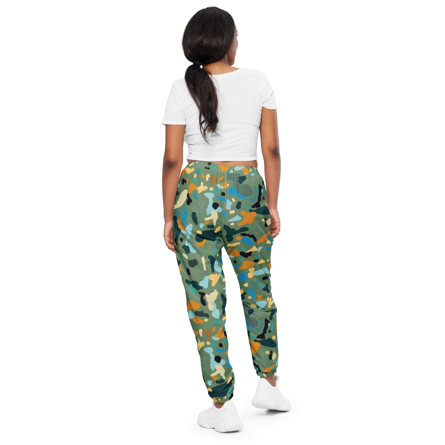 OUT OF SPACE. Unisex water-resistant track pants. FAKE HUMAN BEING.