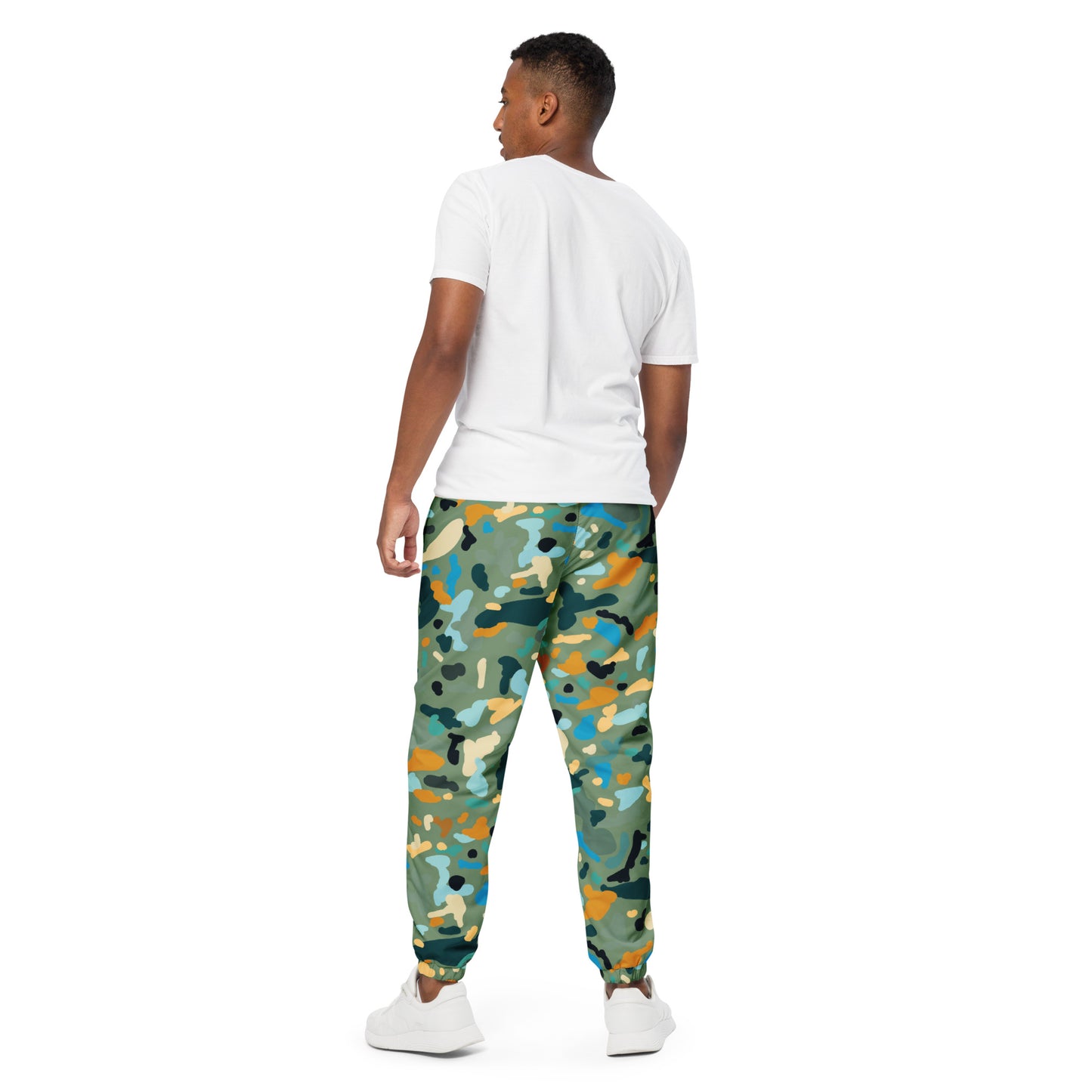 OUT OF SPACE. Unisex water-resistant track pants. FAKE HUMAN BEING.