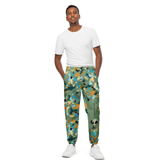 OUT OF SPACE. Unisex water-resistant track pants. FAKE HUMAN BEING.